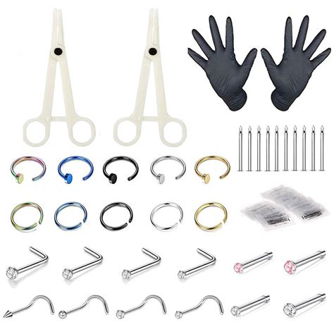 Piercing kit amazon - Piercing Jewelry and Tool Kit : 70PCS body jewelry piercing kit for nose septum, ear, cartilage, tragus, helix, eyebrow,lip, tongue, belly button navel piercings. Needles, gloves and tools are included. High Quality Material: Made of good quality stainless steel, high resistance to rust, lead-free and nickel-free, safe to wear.